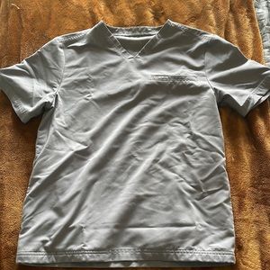 Two pairs of gray Jaanuu men’s scrubs size mall - barely worn.